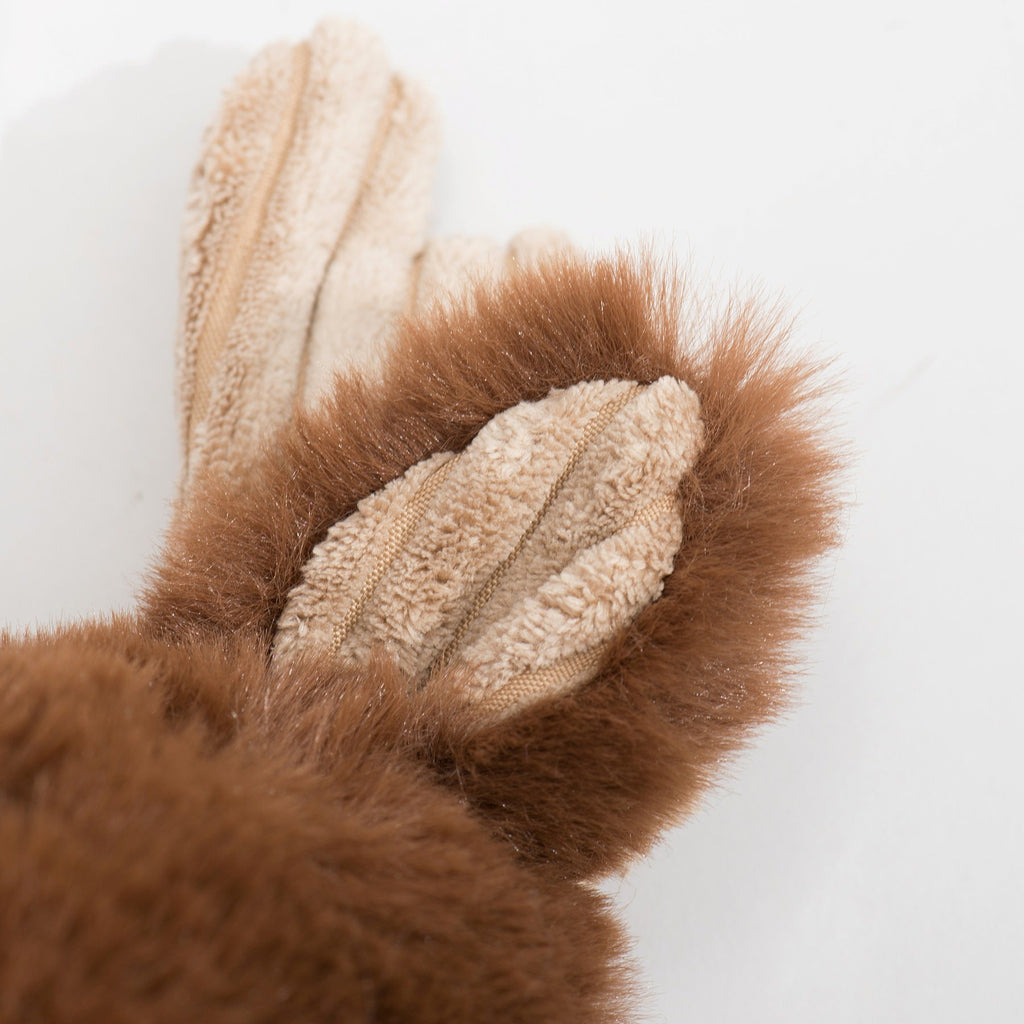 Maple Moose X-Brace plush dog toy close-up, cream striped fabric on brown ear