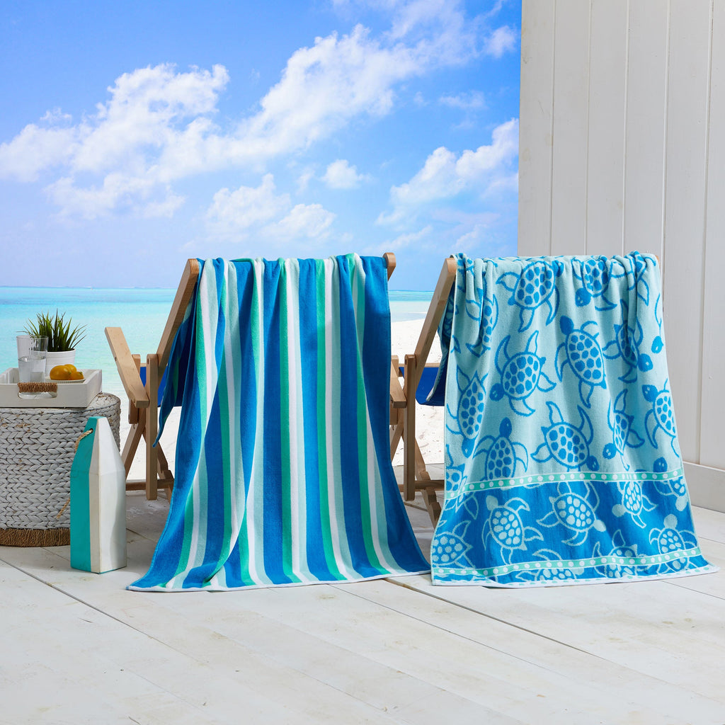 Turquoise cotton velour beach towels: striped design and sea turtle print.