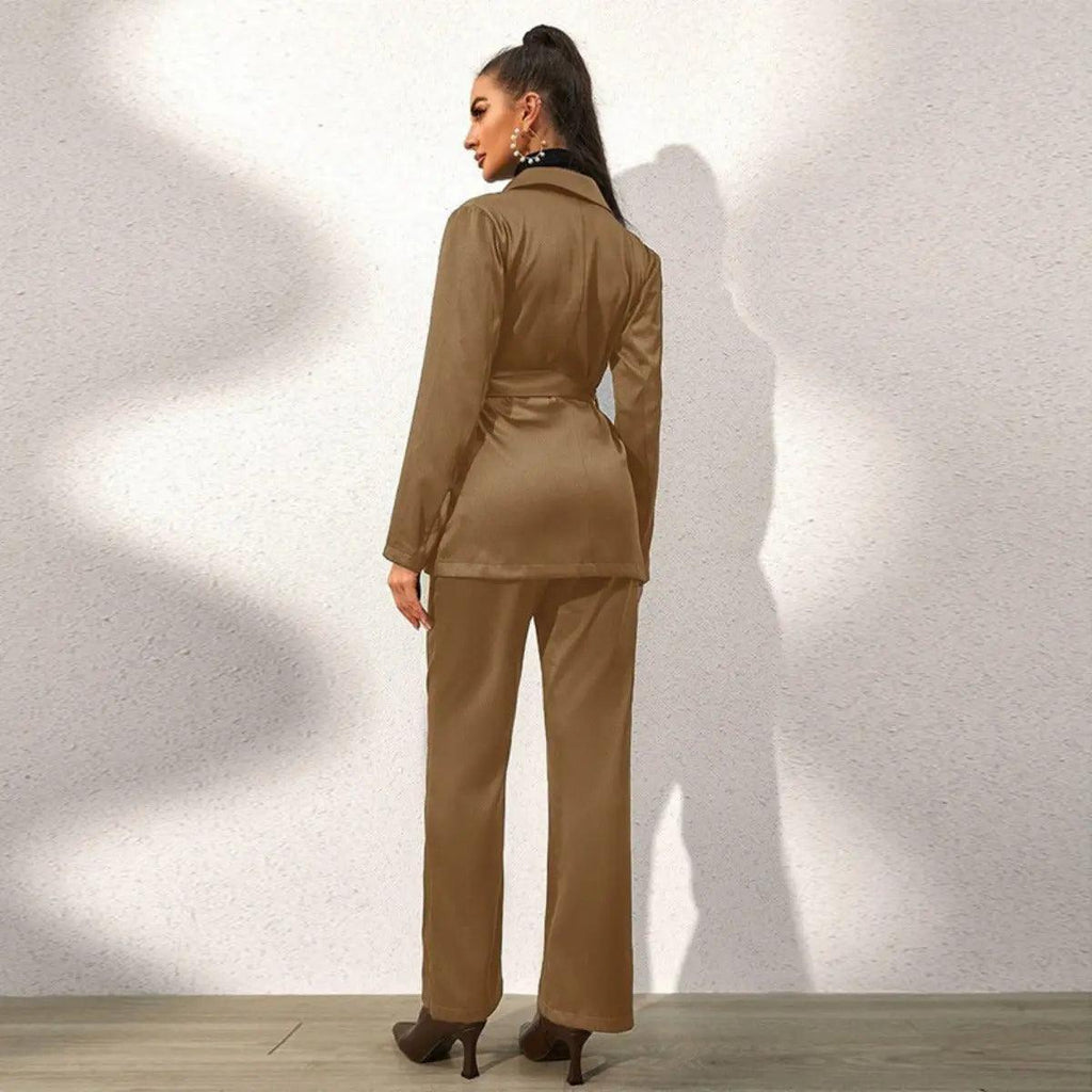 Women’s dark khaki blazer and matching pants suit set, rear view with tapered waist