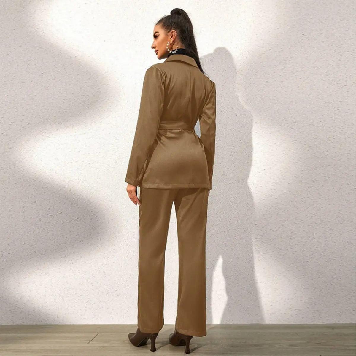 Women’s dark khaki blazer and matching pants suit set, rear view with tapered waist