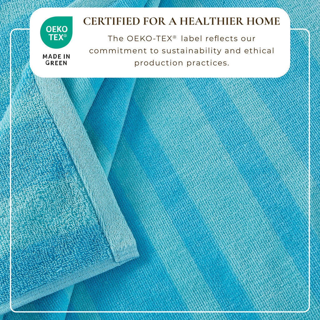 Turquoise cotton velour beach towel close-up, plush looped terry texture