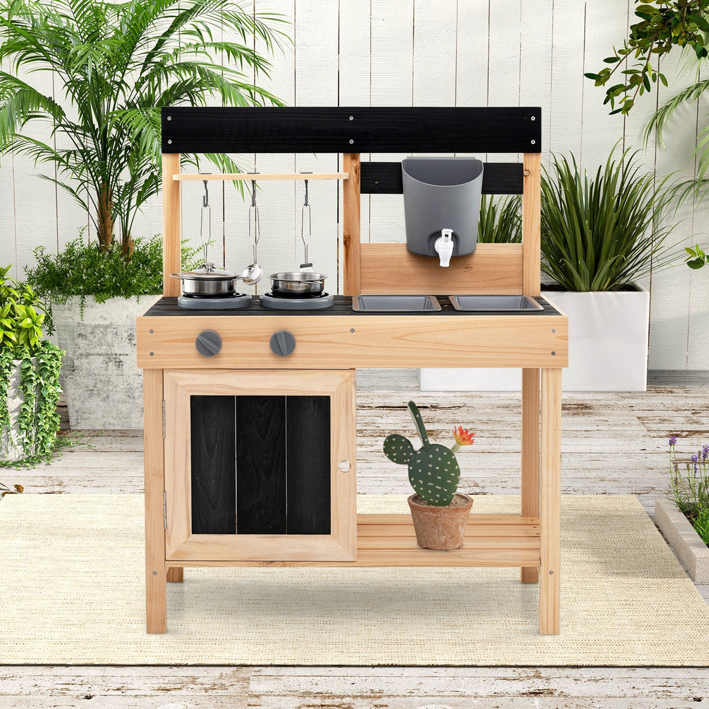 Kids wooden outdoor play kitchen with black cooktop, two pots on burners, and gray sink