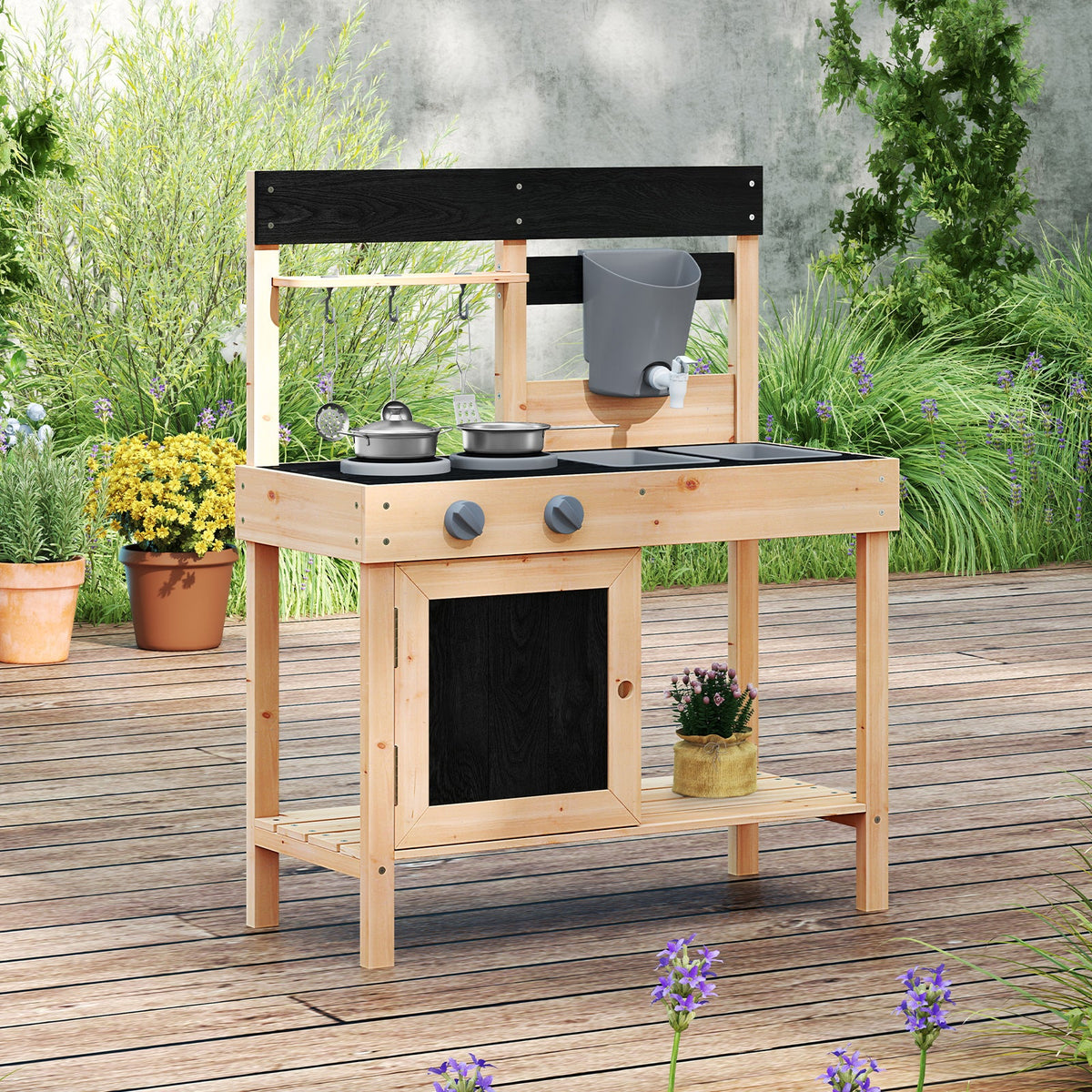 Outdoor kids play kitchen in natural wood with black cooktop and gray removable sink
