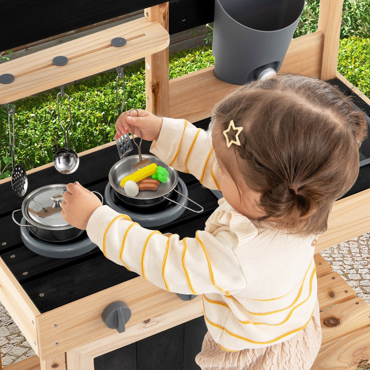 Wooden kids play kitchen with two pots, gray removable sink, and black cooktop