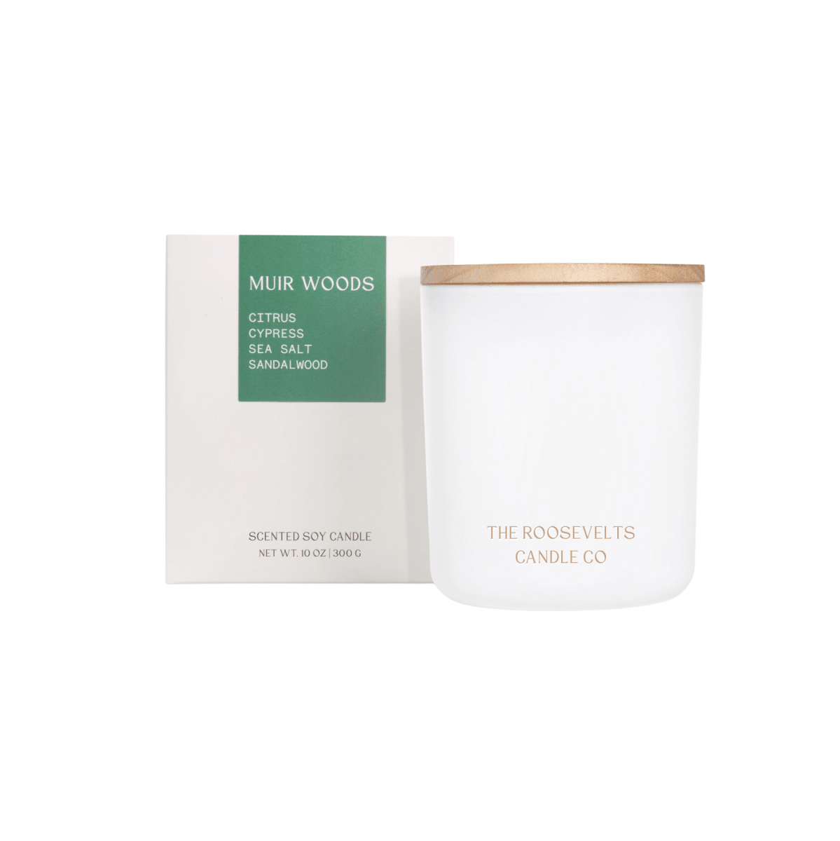 White candle jar with green Muir Woods label and wood lid