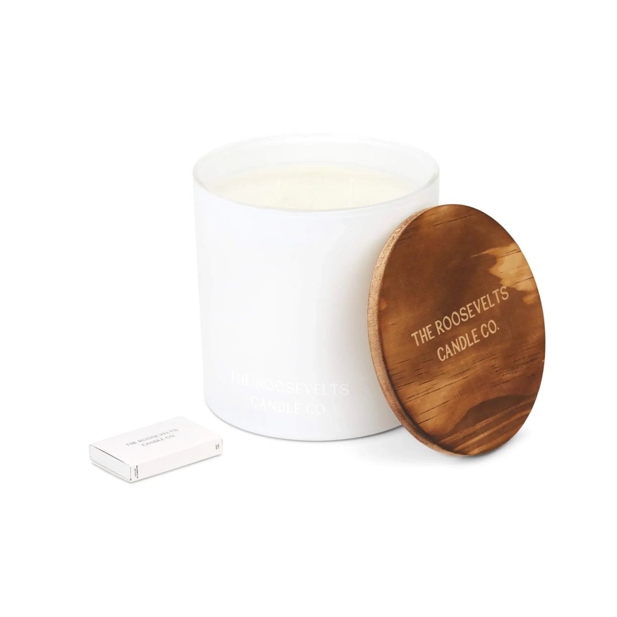 White candle jar with natural wood lid and The Roosevelts Candle Co branding