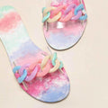 Pastel tie-dye open-toe flat slide sandals with colorful chain strap detail