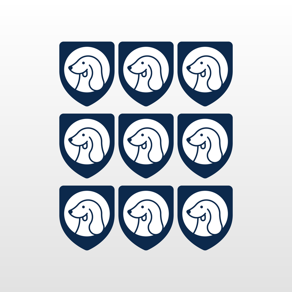 Nine dark-blue shield icons with smiling child face logo