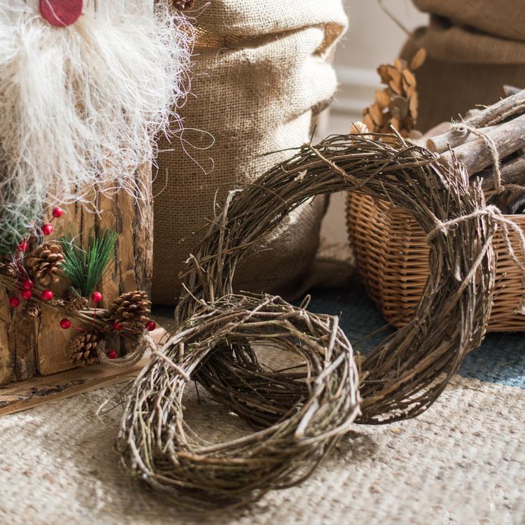 Dark twig wreath with pine sprigs and misty burlap garland accents