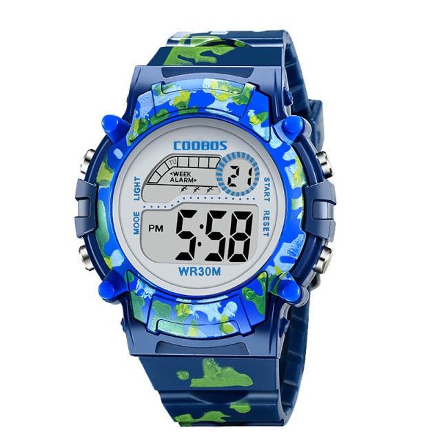 Kids navy blue digital camouflage LED wristwatch with round LCD display, WR30M.