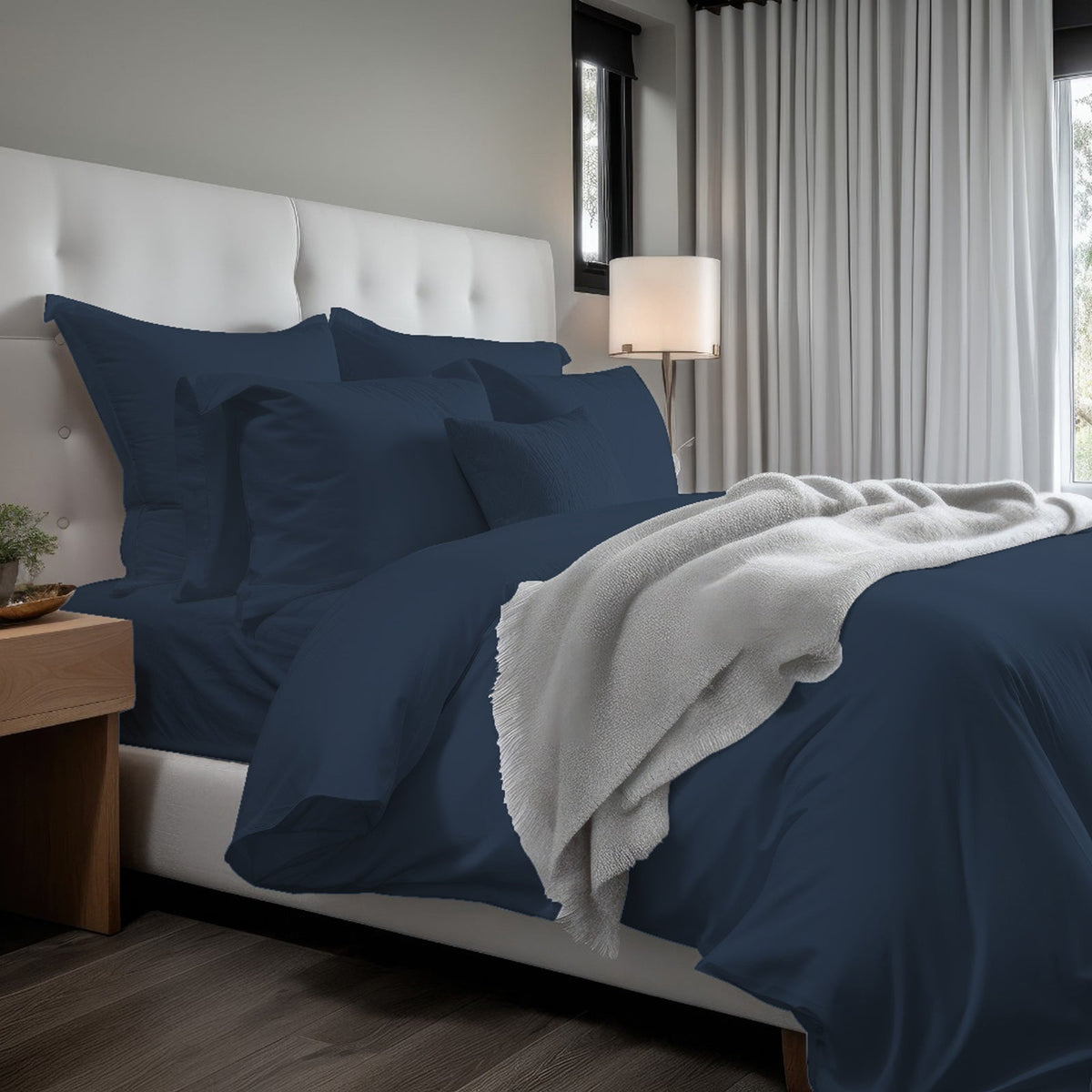 Cotton sateen solid duvet cover set in navy blue with matching pillow shams