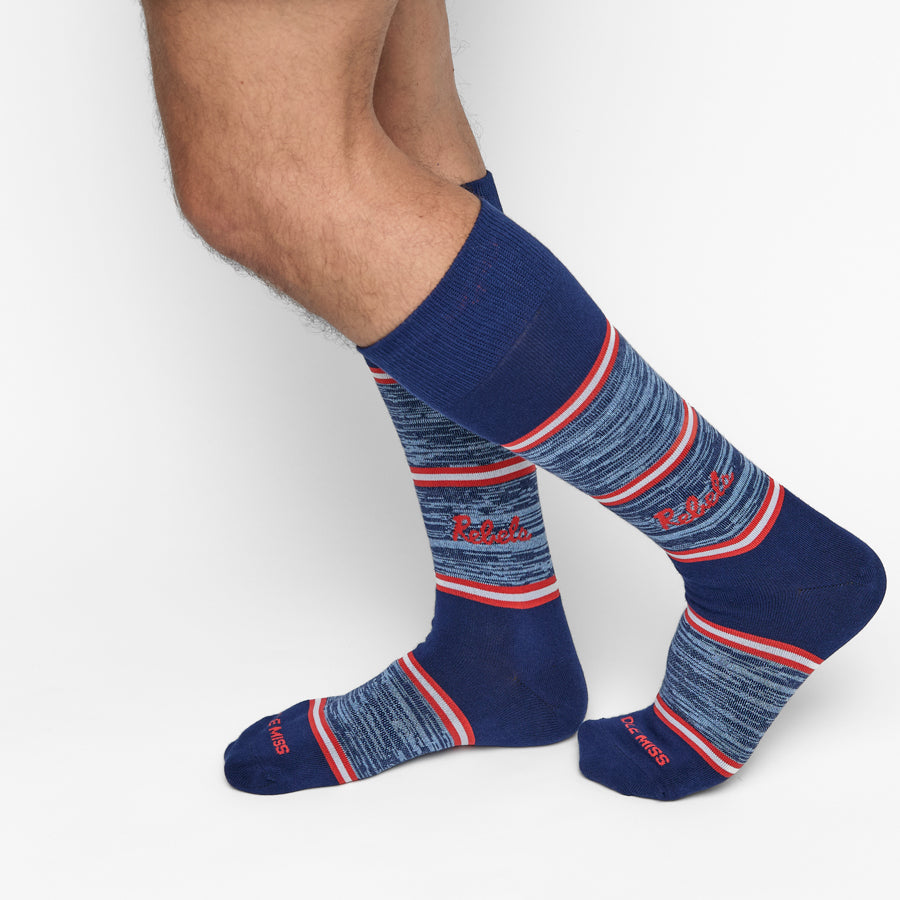 Navy striped crew socks with red trim, shown on legs