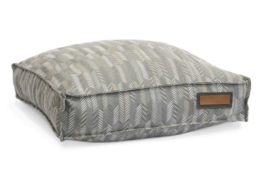 Merle chevron lounger pet bed with bolster and leather-look logo patch