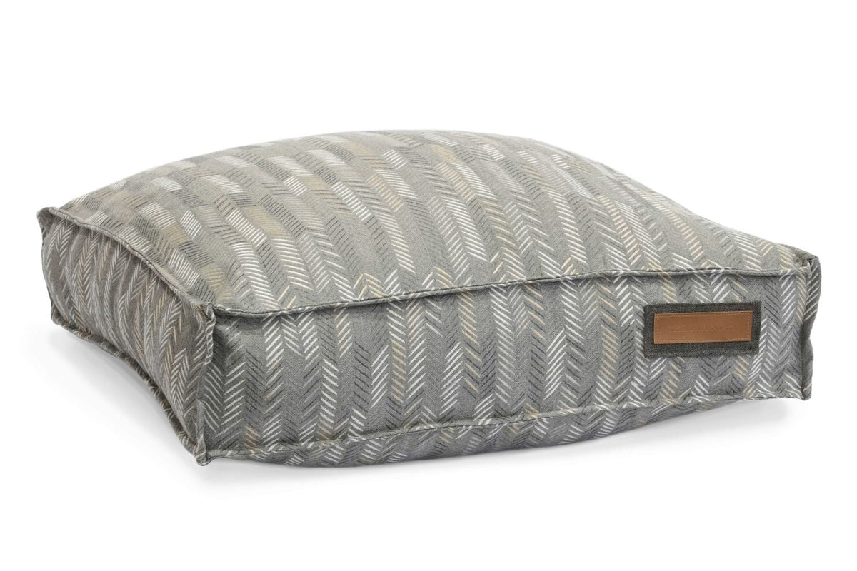 Merle chevron lounger pet bed with bolster and leather-look logo patch