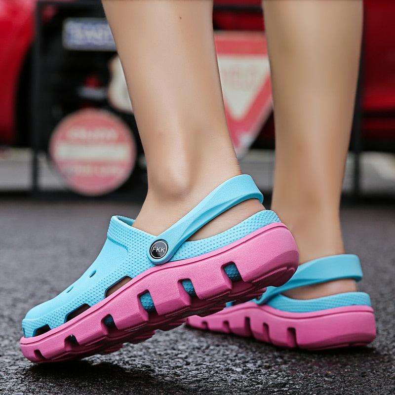 Men's slip-on garden clog sandals, light blue with pink midsole and perforated design
