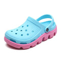 Light blue men’s perforated clogs with adjustable strap and pink rugged sole