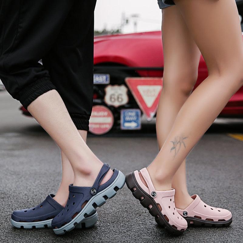 Men's navy and pink perforated jelly clogs with adjustable straps