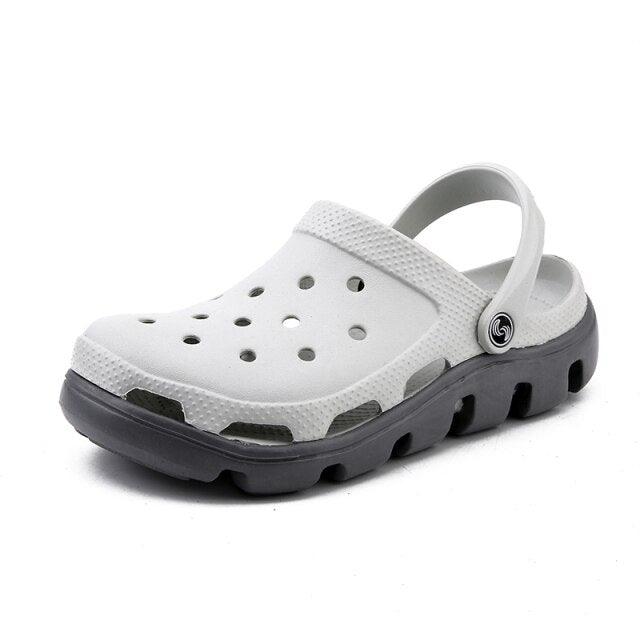 Men's white perforated jelly clogs with adjustable strap and dark outsole