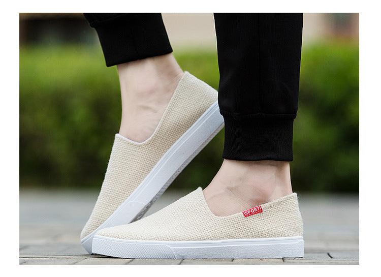 Beige canvas slip-on sneakers with white rubber sole