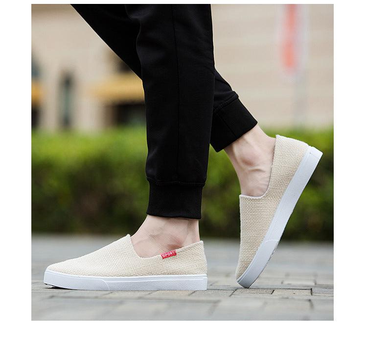 Beige canvas slip-on sneakers with white rubber sole