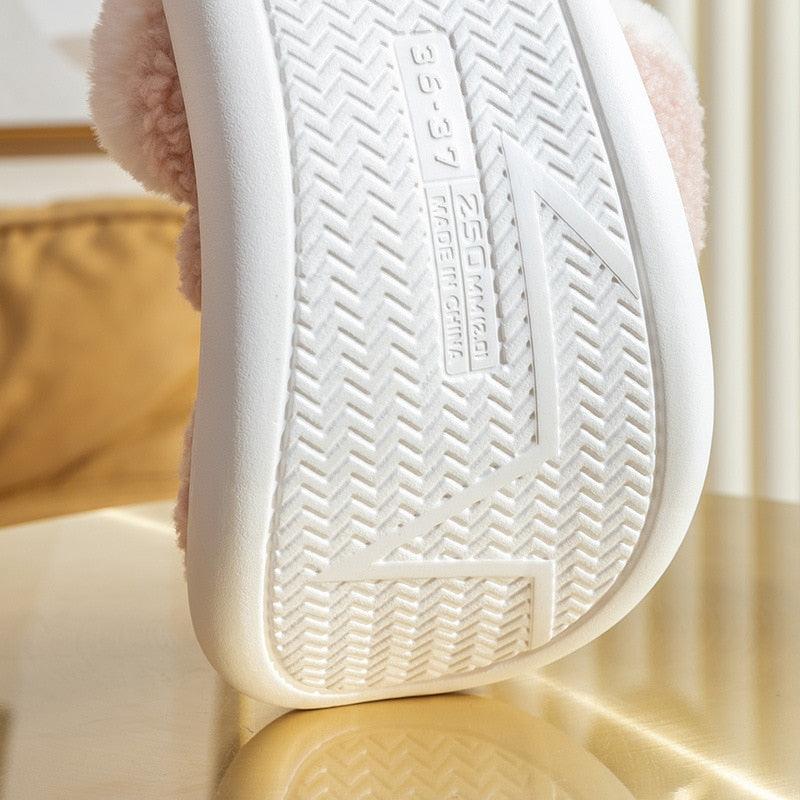 White thick-soled slipper outsole with textured herringbone grip