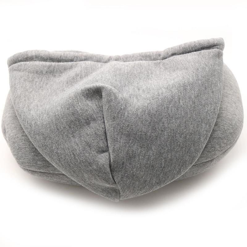 Hooded travel neck pillow, light gray side view with hood and U-shaped neck support