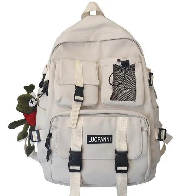 Light beige backpack with front pockets, mesh side pocket, and adjustable straps