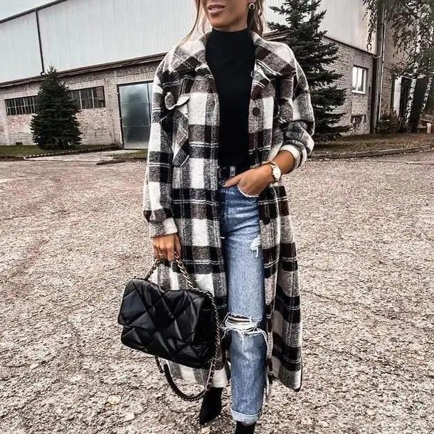 Black, white, and red plaid long coat with button closure and turned-down collar