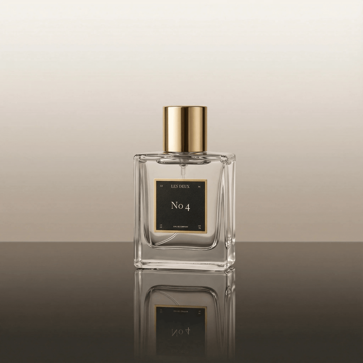 Square glass perfume bottle with gold cap, front label showing No 4