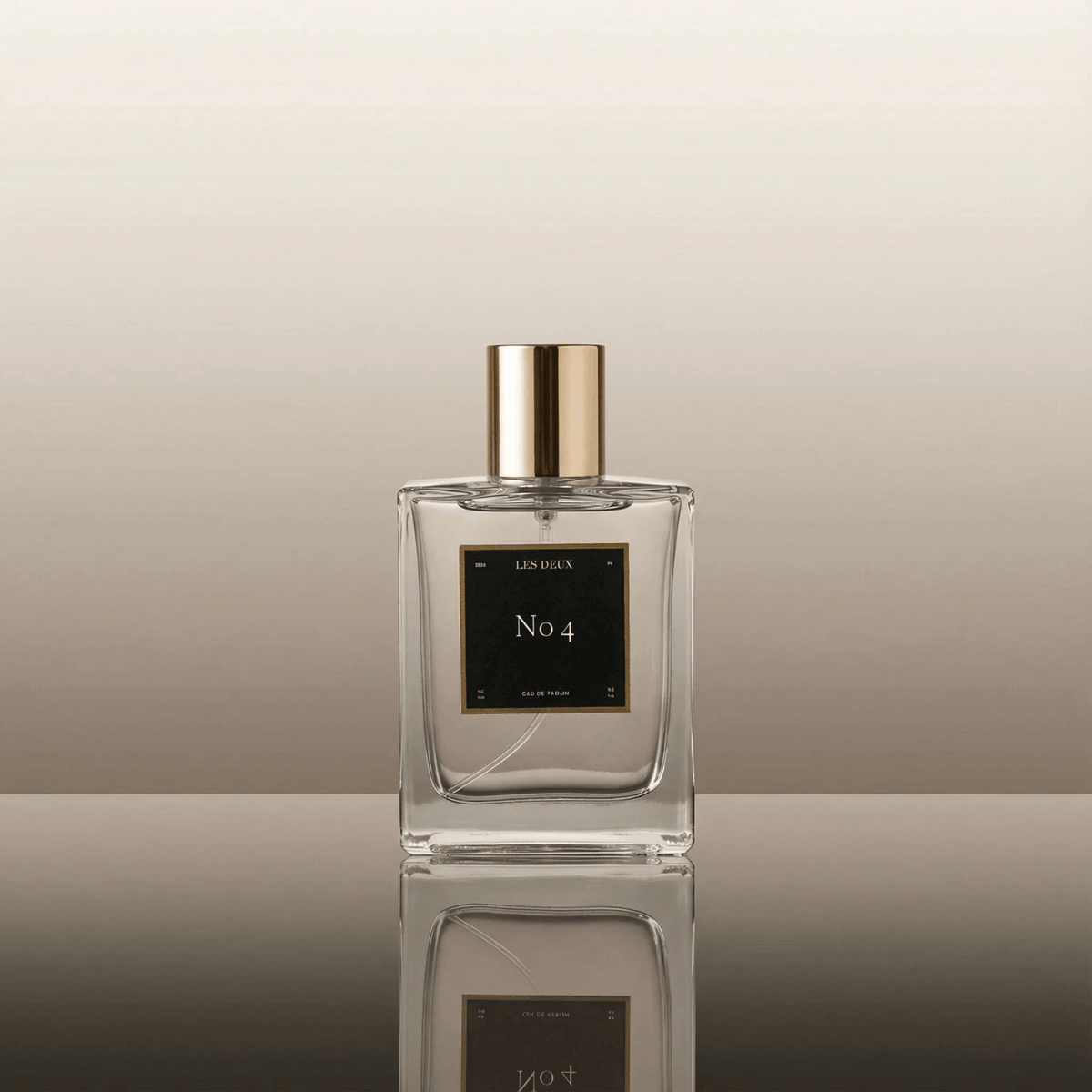 Square glass perfume bottle with gold cap and No 4 label