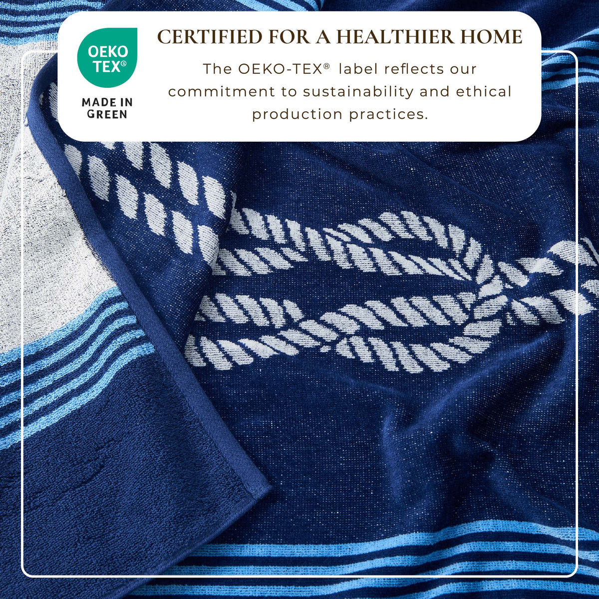 Close-up of blue cotton velour beach towel with light striped woven pattern