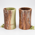Onyx cylinder vase set, green and brown striped stone with glossy cylindrical shape.