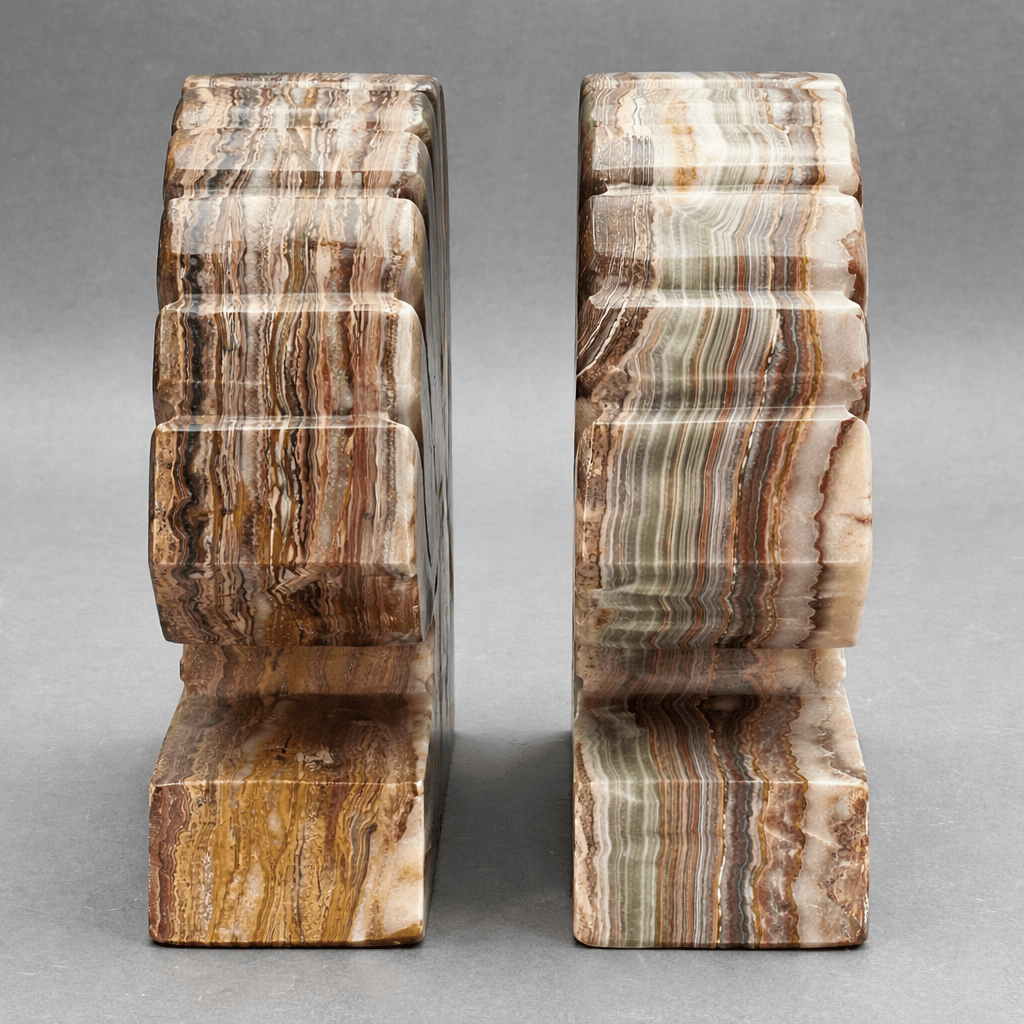 Stone bookend pair with vertical striped brown-and-cream faces