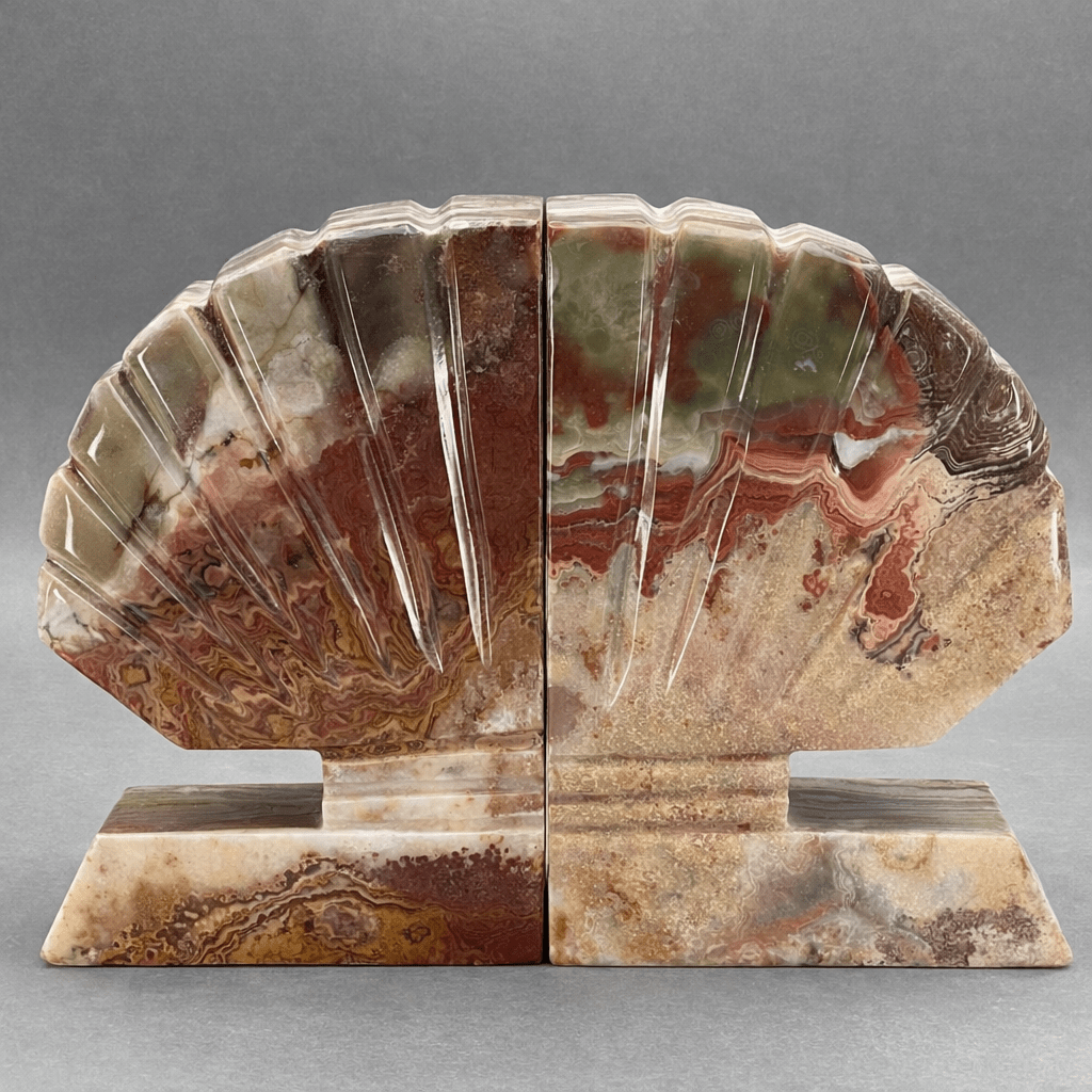 Gemstone shell bookend pair showing arched striped shell base