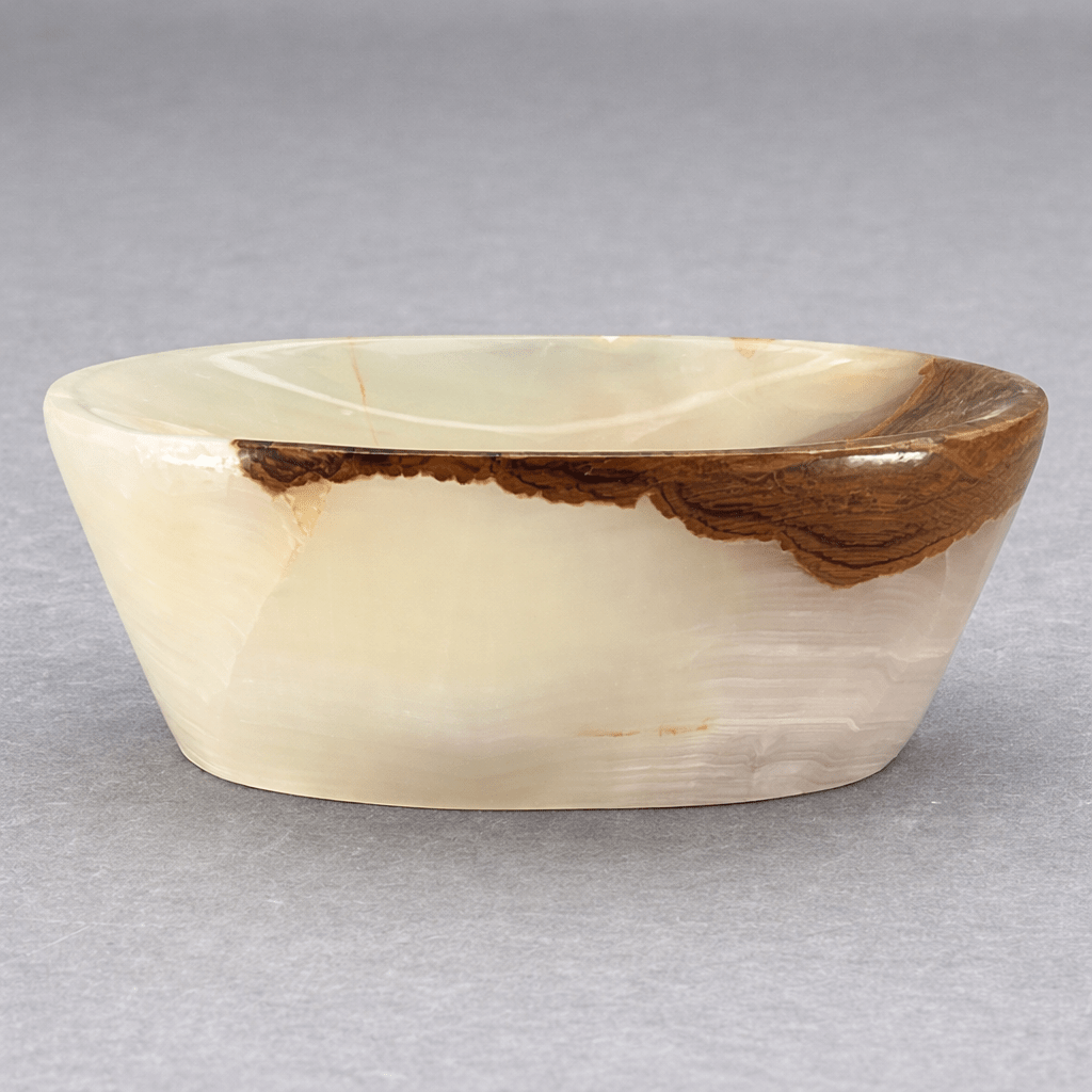 5-inch cream gemstone soap dish with brown veined rim, glossy cupped oval bowl