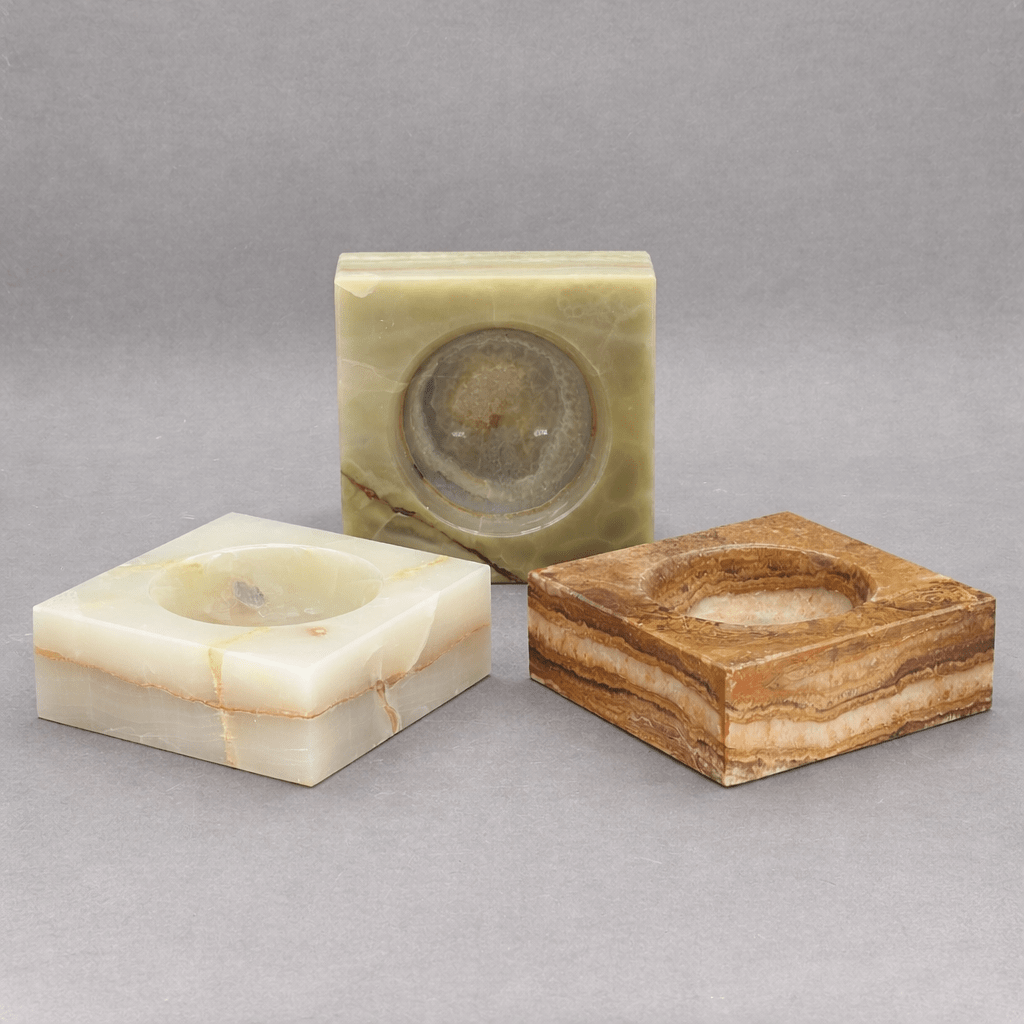 Square gemstone bowl set with three round-inset trays in white, green, and brown