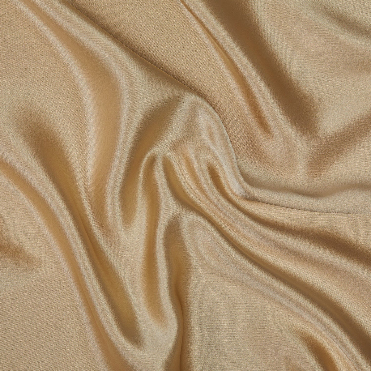 Champagne silk throw fabric close-up with silky sheen and soft folds.