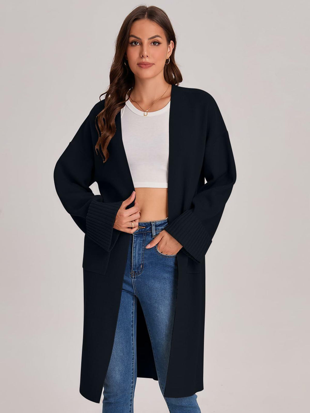 Women’s black long cardigan coatigan with open front and side seam pockets.