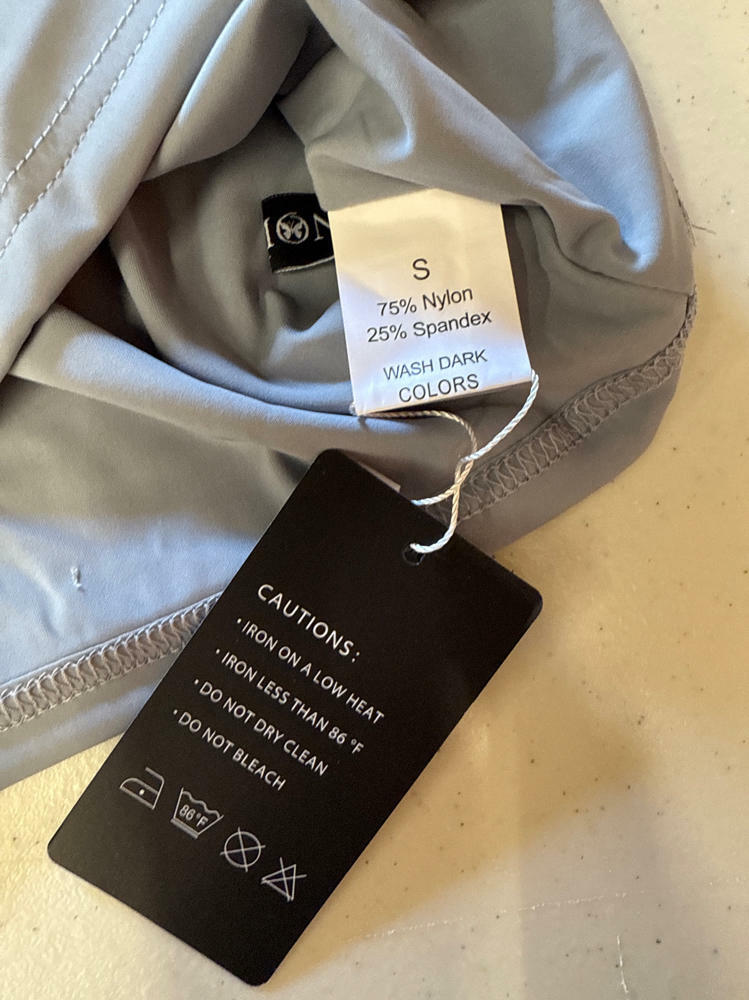 Scoop neck T-shirt fabric tag: size S, 75% nylon 25% spandex