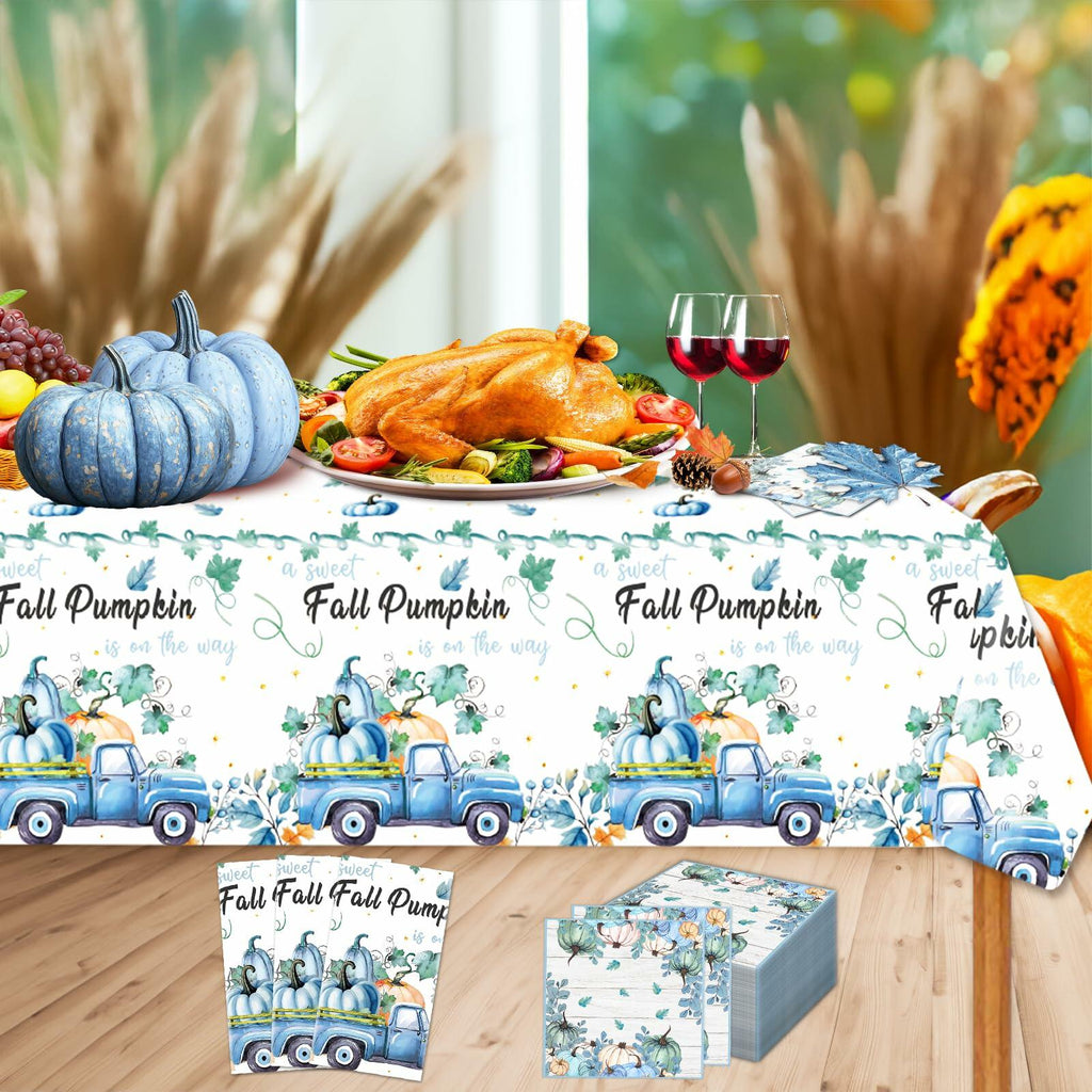 Blue fall pumpkin tablecloth with illustrated trucks, pumpkins, and matching napkins set