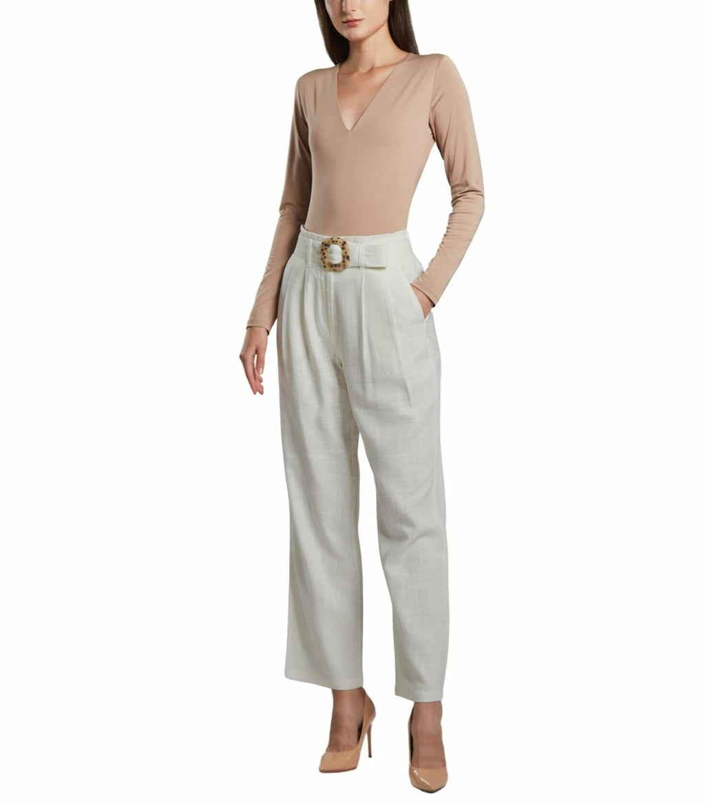 White linen high-rise straight crop pants with tortoise buckle waist, worn on model