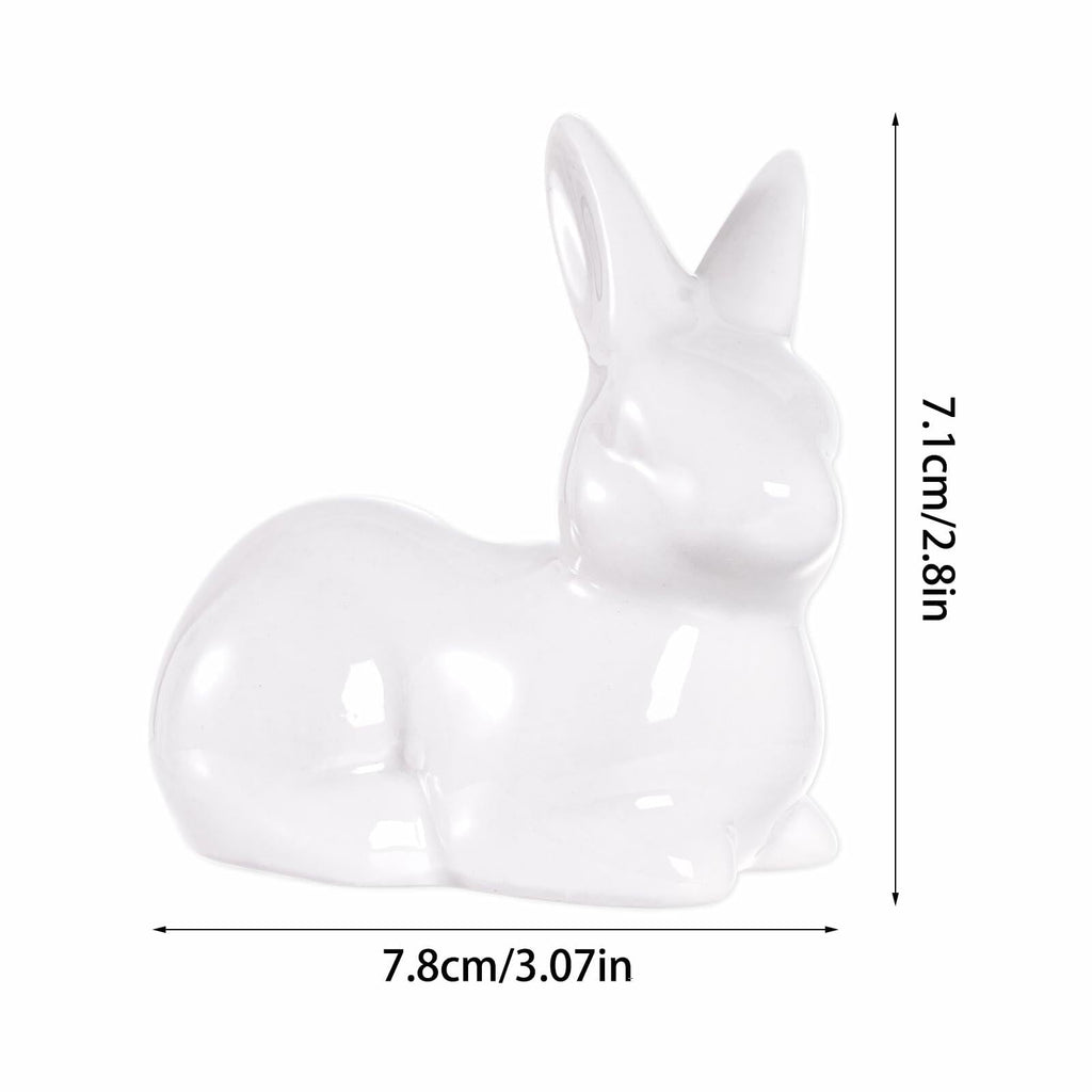 White ceramic Easter bunny figurine, seated rabbit with glossy finish and upright ears.