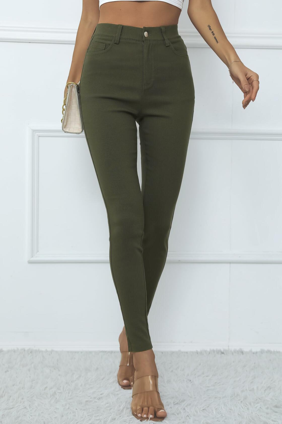 High-waisted army green skinny jeggings with front pockets and slim ankle fit