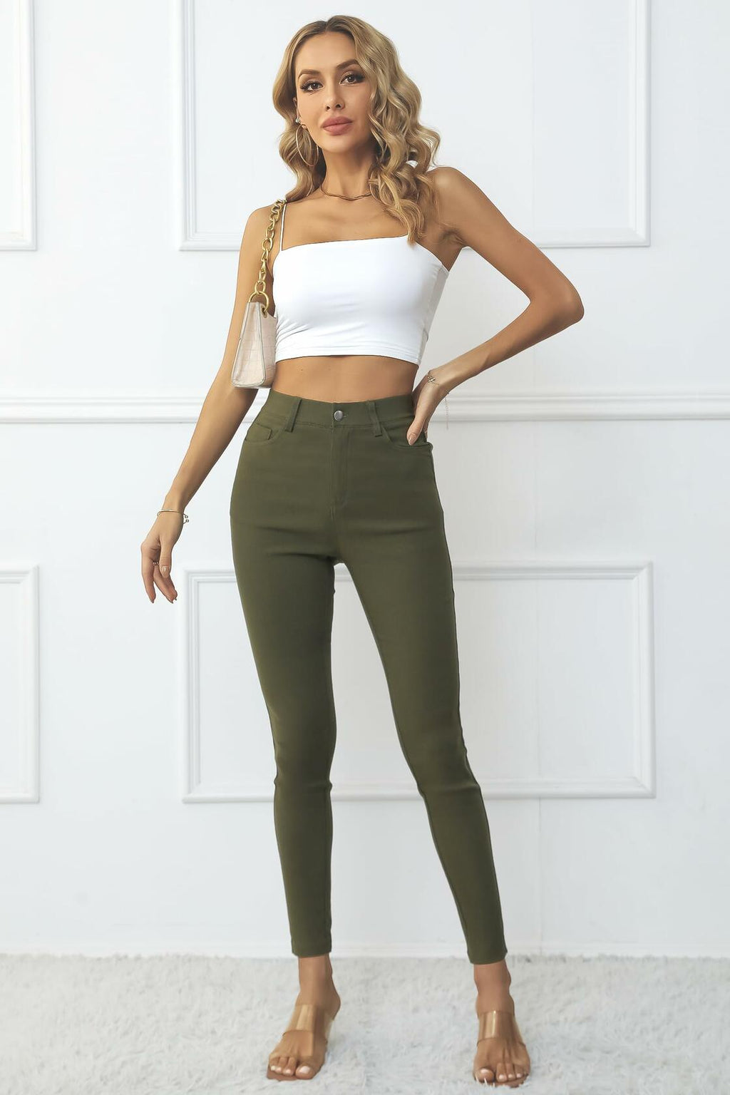 High-waisted army green skinny jeggings with pockets and tapered ankle fit