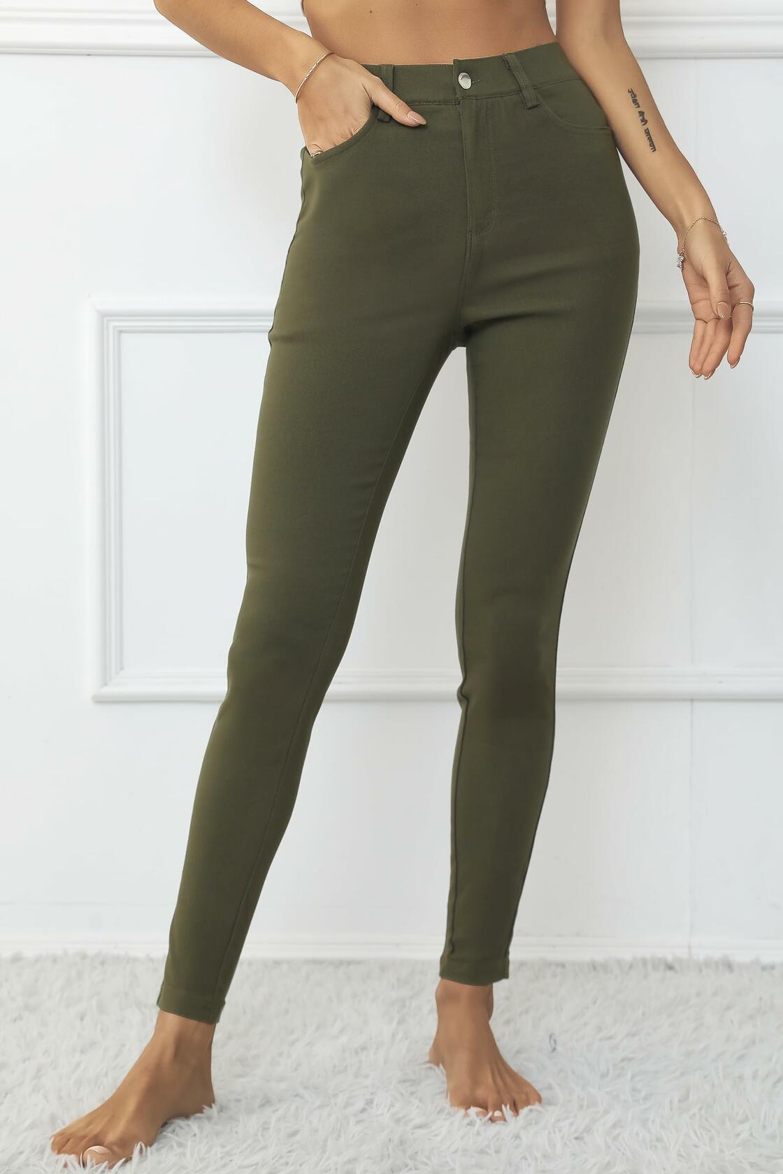 High-waisted army green skinny jeggings with front pockets and ankle-length legs