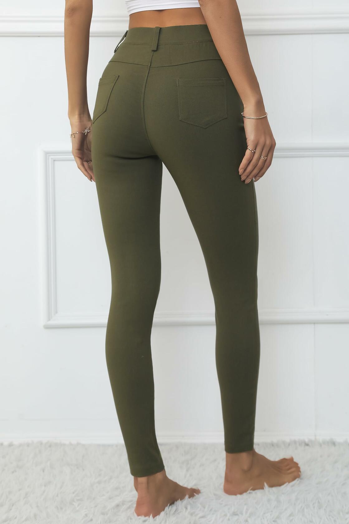 High-waisted army green skinny jeggings with front pockets and smooth fitted legs