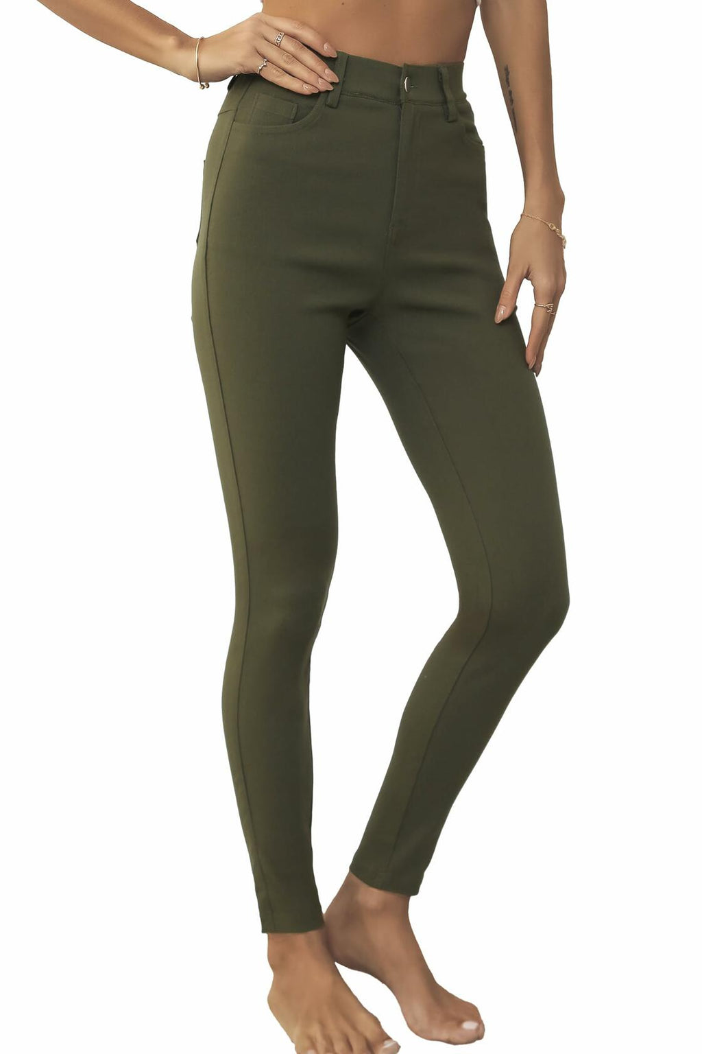 High-waisted army green skinny jeggings with front pockets and button closure