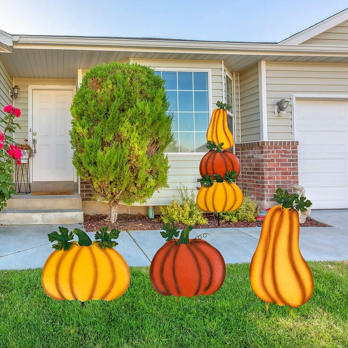 Stacked pumpkin yard stake with yellow and orange pumpkin shapes on a black lawn stake