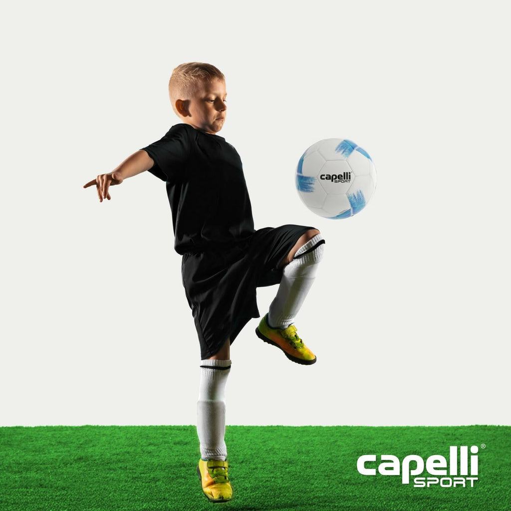 Size 3 soccer ball with blue turquoise brushstroke panels near a soccer player