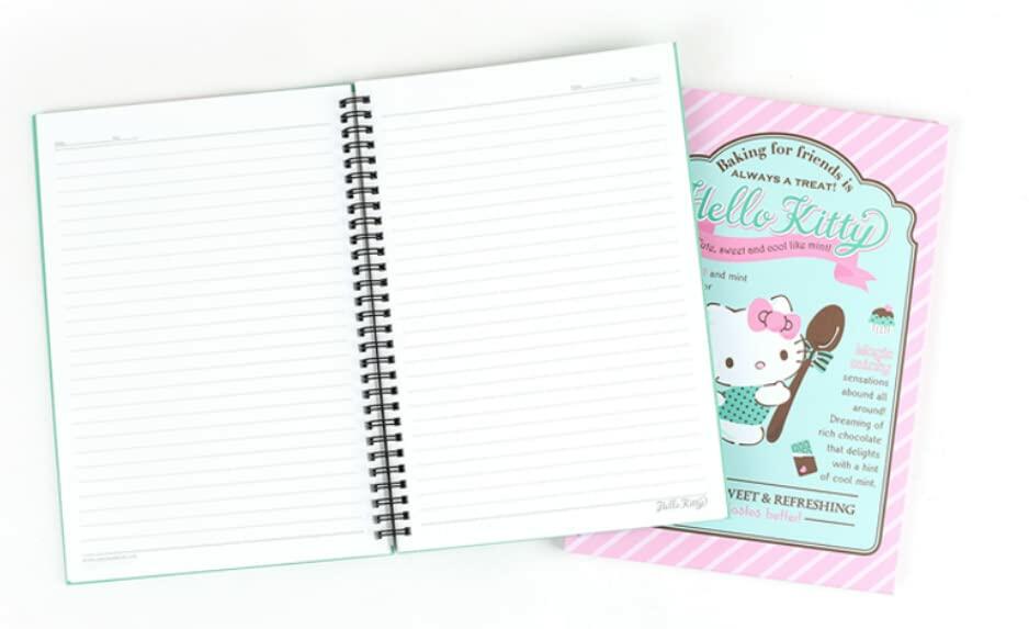 Hello Kitty hard cover ruled notebooks, open with blank lined pages and spiral binding